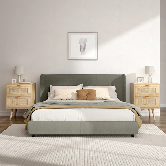 Set Of 2 Rattan Bedside Cabinet, set either side of a bed in a modern bedroom.