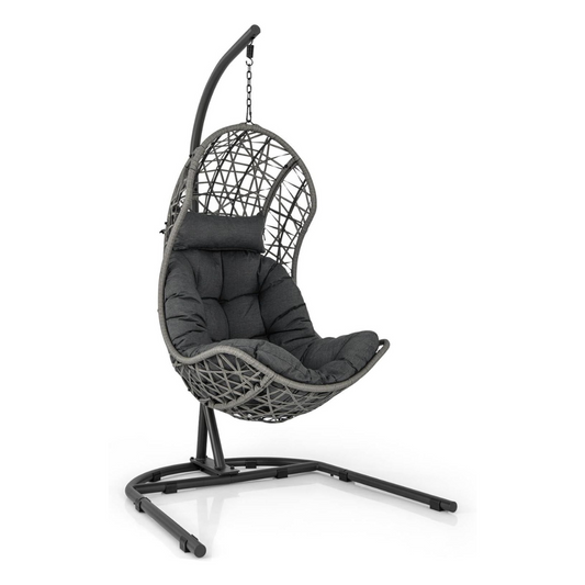 Single Rattan Hanging Egg Chair And Stand, white background.
