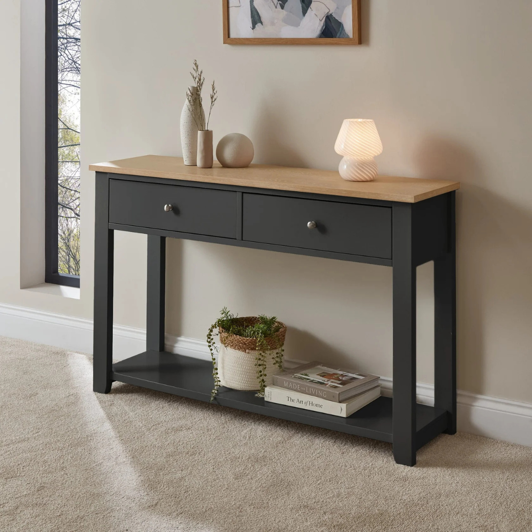 Slate Grey Console Table with Drawers, angled view in model home.