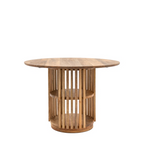 Wooden dining table with round top and cylindrical base on a white background