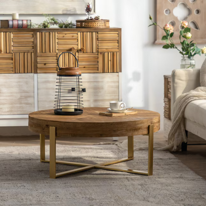 Circle Solid Wood Coffee Table in a modern living room, sat on a grey rug.
