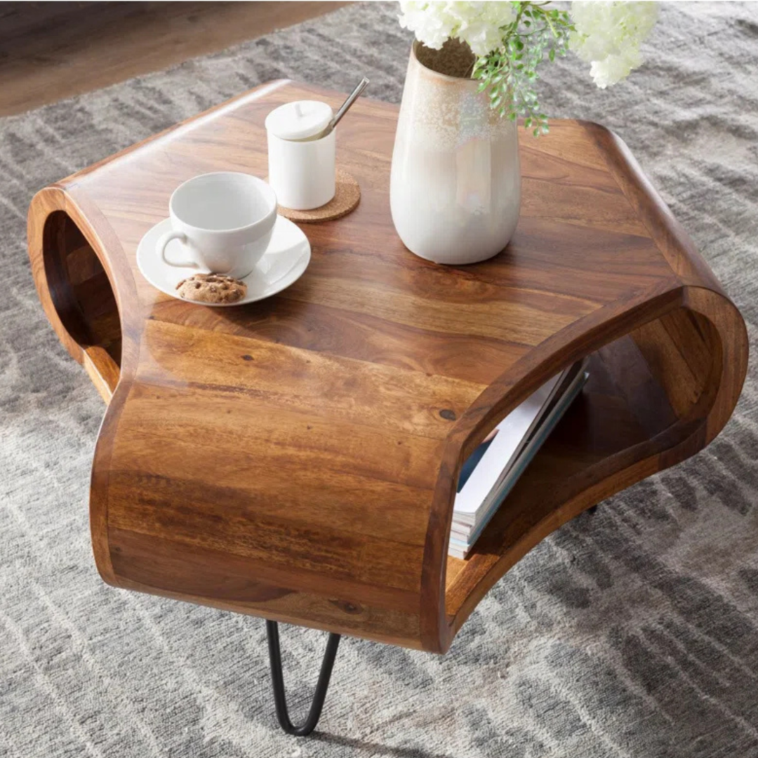 Solid wood quirky coffee table with sculpted shape, top view.