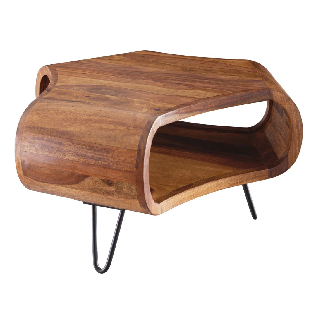 Solid wood quirky coffee table with sculpted shape, white background.