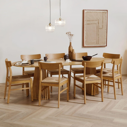 Solid Wood Woven Chairs Dining styled around a wood dining table in a modern style interior