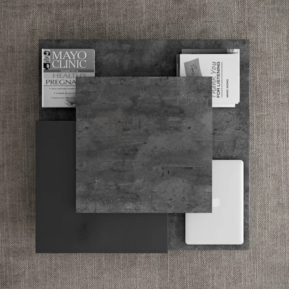Stone design dark grey coffee table with layered surface, top view.