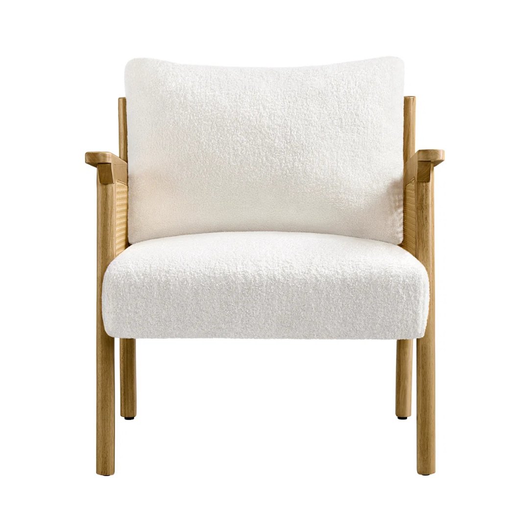 upholstered indoor rattan armchair with wood frame, white background, front view.
