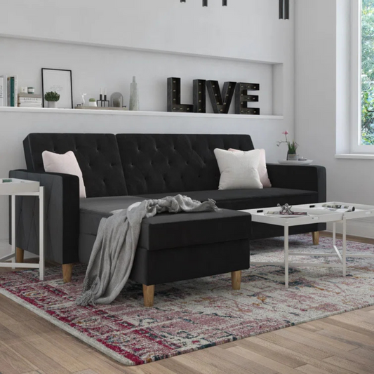 Velvet Black L Shape Sofa Bed With Storage, set in a modern home, angled view.