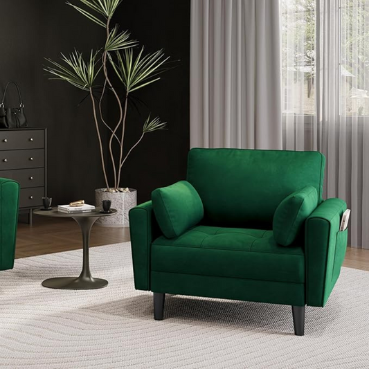 velvet emerald green armchair with matching cushions, set in the corner of a modern living room.