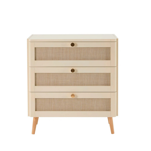 Beige chest of drawers with woven front panels on a white background