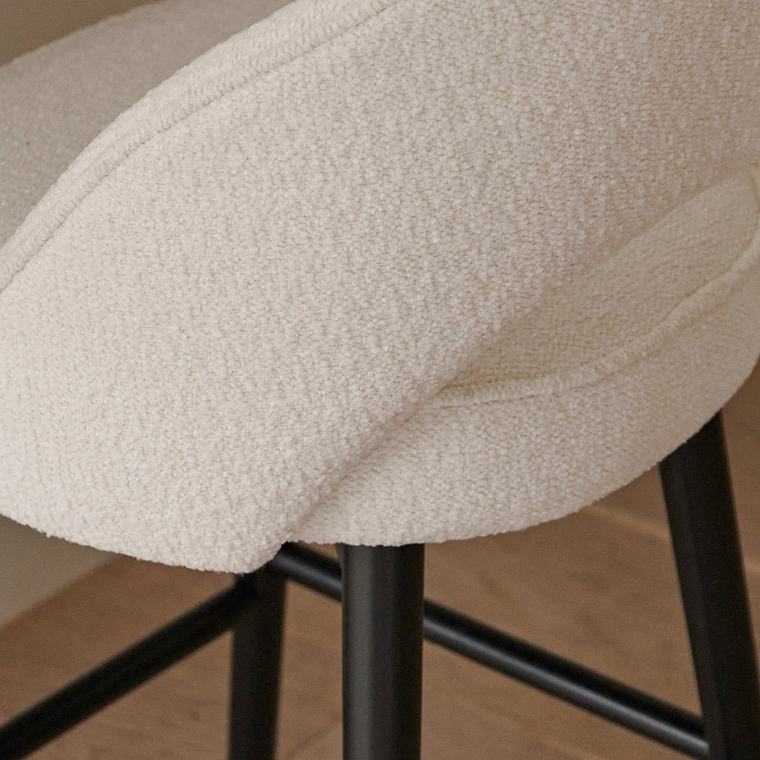 White Boucle Bar Stool Black Legs close up of the boucle fabric 