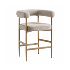 Bar stool with beige cushioned seat and backrest on a white background