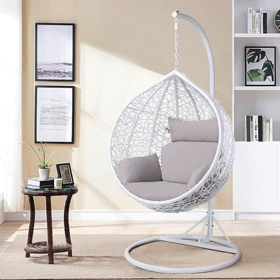 White Tear Drop Hanging Egg Chair And Stand, set in a modern home.