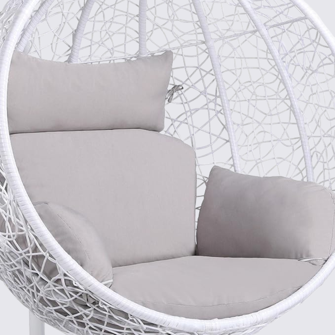 White Tear Drop Hanging Egg Chair And Stand, close up of design and cushions.