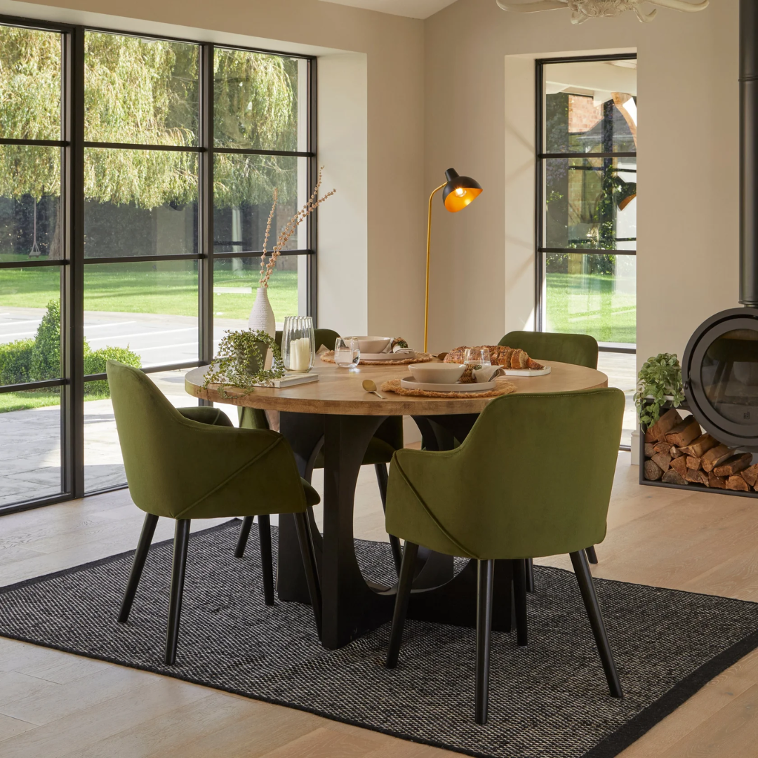 Suede Olive Green Dining Chairs styled in a cosy farmhouse dining rooom